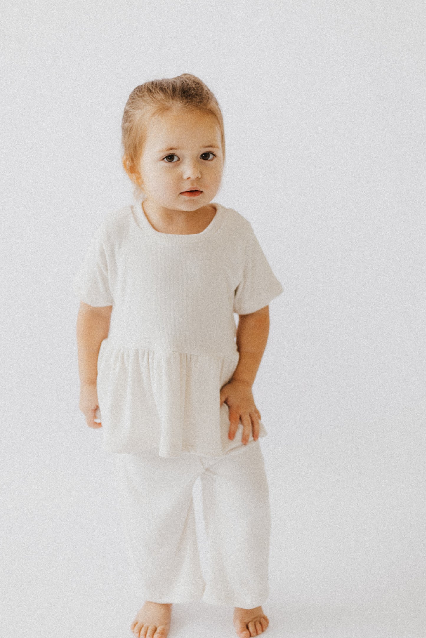 Ivory Rib Peplum