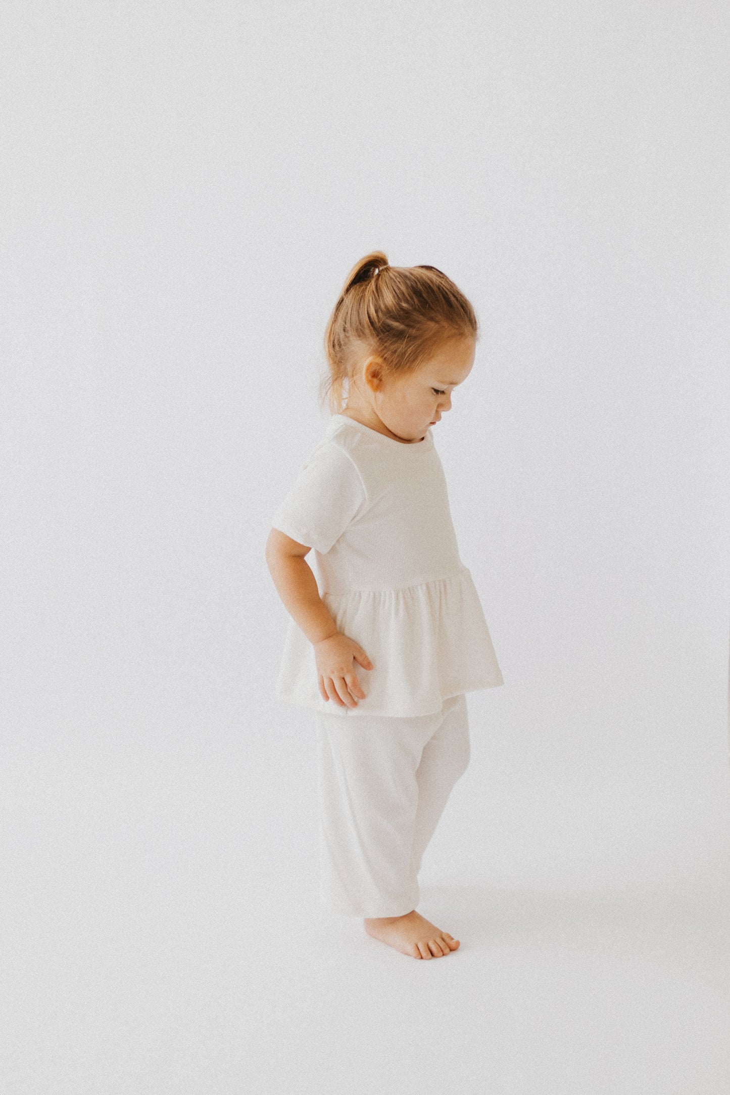 Ivory Rib Peplum